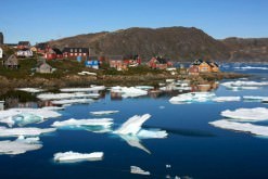 View of ice and village in Kulusuk, Greenland