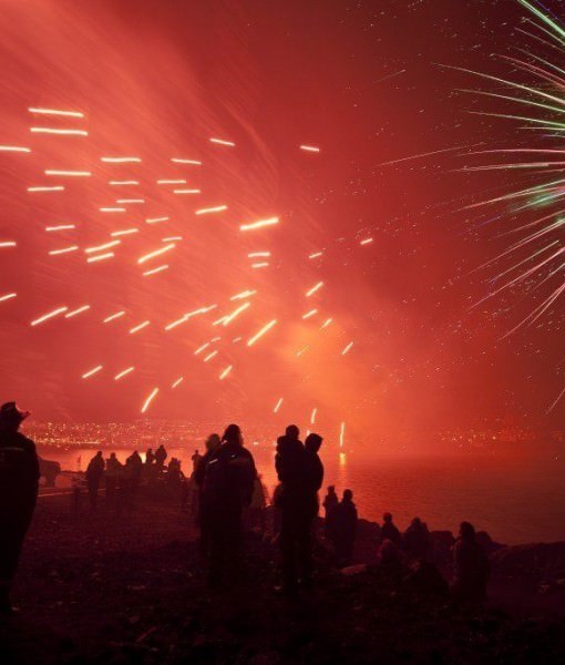 Bonfire and fireworks in Reykjavik, the capital of Iceland. New Years Eve bonfire is always every 31st of December every year in Iceland with fireworks.