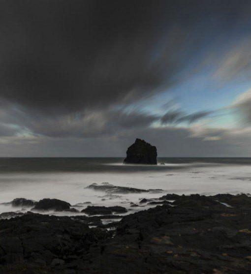 Reykjanes rocky cost. The famous island Eldey far on the left side of the photo.