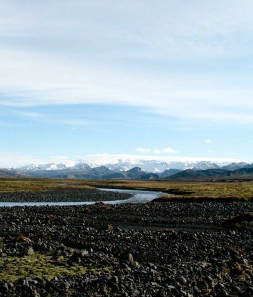 Markarfljót river in the south of Iceland is about 100 km (62 miles) long. Behind is Mýrdalsjökull glacier.