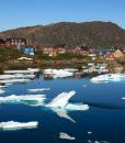 View of ice and village in Kulusuk, Greenland